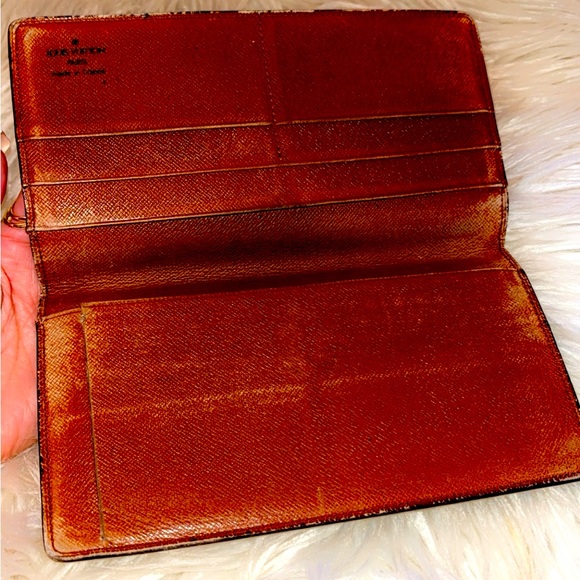 Authentic Louis Vuitton Long Bifold Wallet. Serial #: ET0932 - Picture 10 of 10